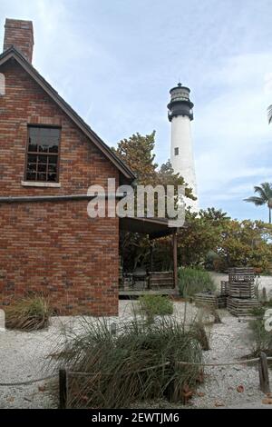 Key Biscayne, FL, USA. The Cape Florida Light & the keeper's cottage in Bill Baggs Cape Florida State Park. Stock Photo