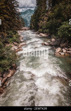 The river Krimmler Ache in the Hohe Tauern National Park in Austria. The Krimmler Ache forms the Krimmler waterfalls. Stock Photo