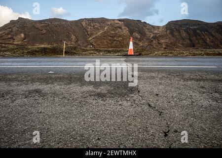 Damage in road called Sudustrandvegur in Iceland after earthquakes in February 2021 very close were the origin of the seismic activity originates. Stock Photo