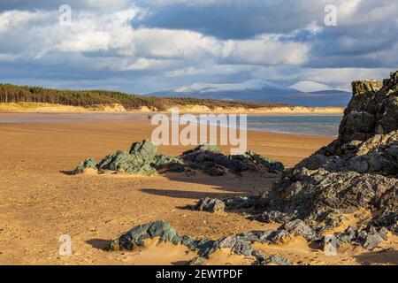 Pillow lava on the northern shore of Llanddwyn Island and Newborough beach, Isle of Anglesey, Wales Stock Photo