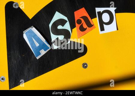 The acronym ASAP is short for 'as soon as possible' and is spelled out in ransom note style topography, USA Stock Photo