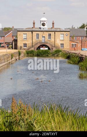 Weedon, Northamptonshire, UK - July 10th 2018: The East Lodge, at the entrance to a former army Ordnance Depot, stands at the end of a waterway. Stock Photo