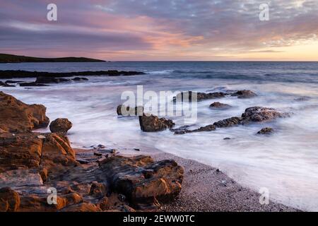 Evening at the coast near Garrylucas beach near the Old Head of Kinsale in West Cork, Ireland. The coastline here is on the famous Wild Atlantic Way. Stock Photo