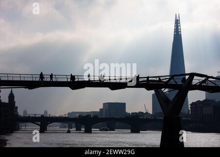 Millennium Bridge and the River Thames in London Stock Photo