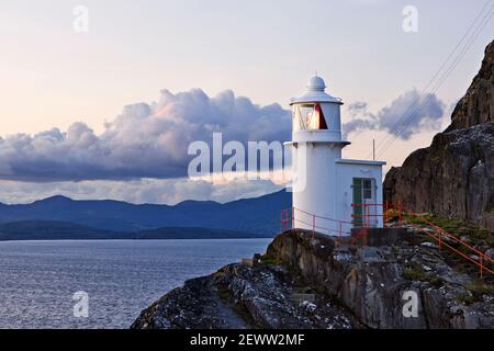 Sheep's Head Lighthouse, County Cork, Ireland. The lighthouse is on the point of Sheep's head [also Muntervary] between Dumanus Bay and Bantry Bay. Stock Photo