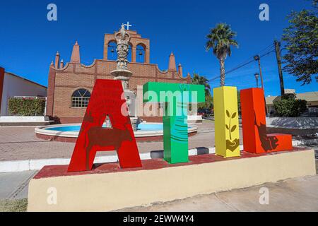 Monumental colored letters and Temple of San Francisco de Asís in Atil, Sonora Mexico. Atil small town in the northwest of the Mexican state of Sonora. The neighboring municipalities are Tubutama, Trincheras, Oquitoa and Altar. It was founded in 1751 Jesuit missionary Jacobo Sedelmayer. The first inhabitants were the Pima Alto or Nebome Indians. Atil means 'Arrowhead', in the Pima language.  (Photo by Luis Gutierrez / Norte Photo)  Letras monumentales de colores y Templo de San Francisco de Asís en Atil, Sonora Mexico. Átil pequeño pueblo en el noroeste del estado mexicano de Sonora.  Los muni Stock Photo