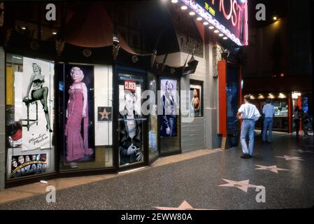 Souvenir shop with posters of Marilyn Monroe and James Dean at the Chinese Theater on Hollywood Blvd.at night.