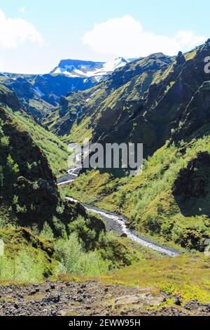 A small stream leading into the valley of Thorsmoerk, Fimmvorduhals hiking trail in Iceland Stock Photo