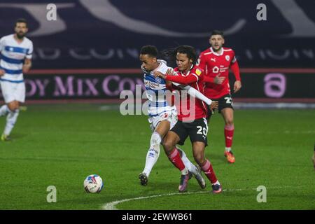 LONDON, ENGLAND. MARCH 3RD. QPRs Chris Willock holds off Barnsleys Toby Sibbick during the Sky Bet Championship match between Queens Park Rangers and Barnsley at Loftus Road Stadium, London on Wednesday 3rd March 2021. (Credit: Ian Randall | MI News) Credit: MI News & Sport /Alamy Live News Stock Photo