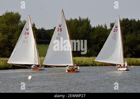 waveney class gaff rigged yachts racing on river waveney at beccles suffolk england Stock Photo