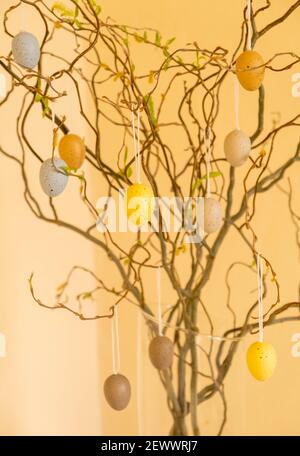 Branches decorated with Easter eggs. Decorations for the Easter holiday Stock Photo