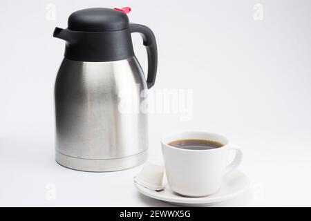 Coffee mug with coffee jar on a white background Stock Photo