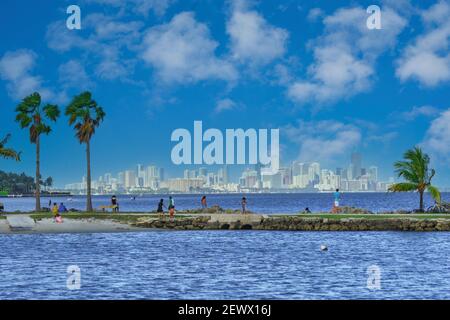 Beach goers on the walkway of the atoll pool at Matheson Hammock Park in Miami, Florida. Stock Photo