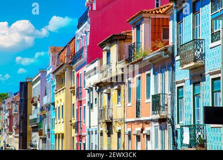 Colorful buildings of Lisbon historic center near landmark Rossio Square. Stock Photo