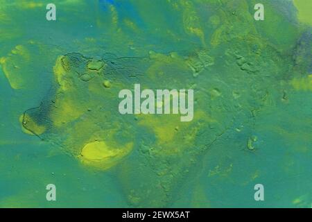 Abstract acrylic green background. Fluid art illustration with swirl patterns. Liquid marble texture. Modern backdrop Stock Photo
