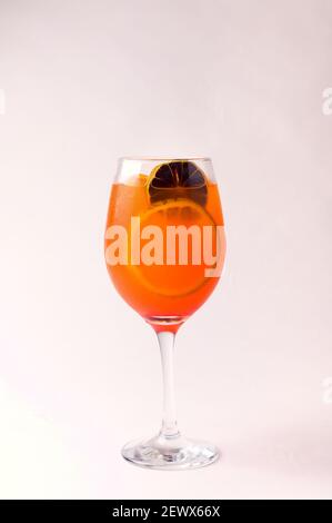 A glass of Aperol Spritz isolated in the light background Stock Photo