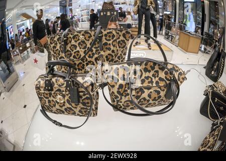 Coach handbags on display at the Coach boutique within Macy's in New York  on Tuesday, August 4, 2015. A tractor trailer containing $500,000 worth of Coach  handbags was stolen from the SalSon