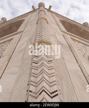 AGRA, INDIA - MARCH, 26, 2019: a close up low angle shot of a corner of the taj mahal Stock Photo