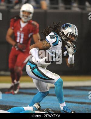 Carolina Panthers safety Tre Boston tackles Seattle Seahawks wide receiver  Tyler Lockett for a loss of yards in the first quarter of a NFC divisional  playoff football game at Bank of America