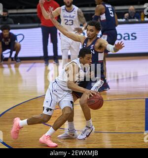 Newark, New Jersey, USA. 4th Mar, 2021. Seton Hall Pirates guard Jared Rhoden (14) gets pressure fromConnecticut Huskies guard James Bouknight (2) in the first half at the Prudential Center in Newark, New Jersey. UConn defeated Seton Hall 69-58. Duncan Williams/CSM/Alamy Live News Stock Photo