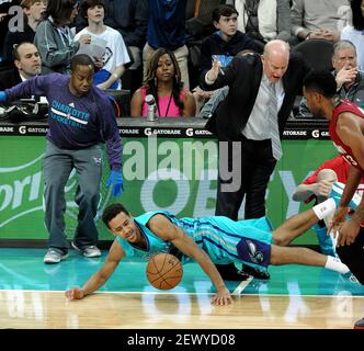 Charlotte Hornets guard Brian Roberts (22) releases a jump shot as  Minnesota Timberwolves guard Mo Williams (25) defends during second half  action on Monday, Jan. 19, 2015, at Time Warner Cable Arena