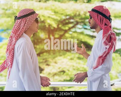 Two Arab men talking to each other. Business concept. Stock Photo