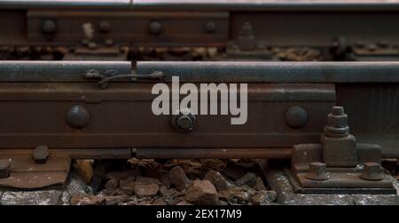 Technological joint of rails on railway track section. Stock Photo