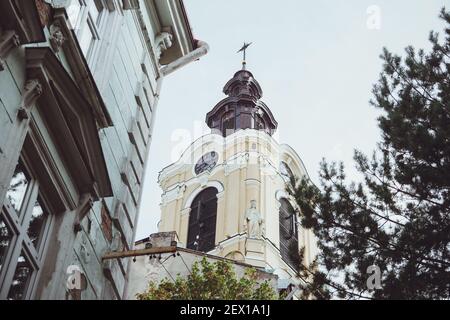 Clock tower of Cathedral Basilica of Assumption of the Blessed Virgin Mary and St. John the Baptist. This 71-meter-high building is one of the most ch Stock Photo