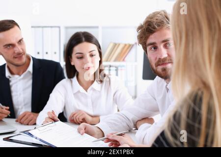 Teamwork discusses problems in the workplace Stock Photo