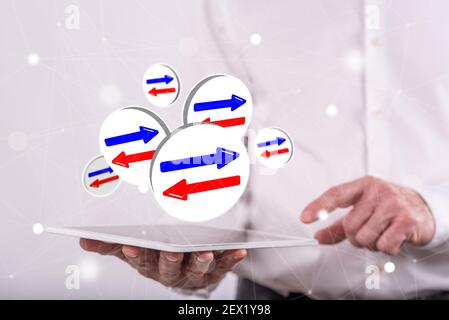 Decision concept above a tablet held by a man in background Stock Photo