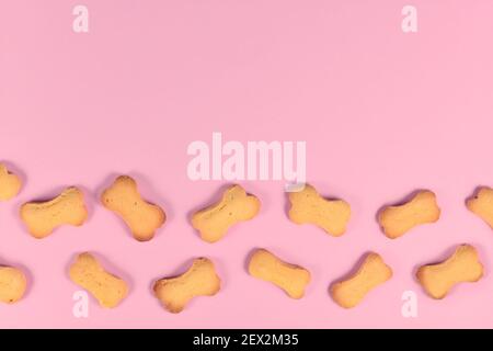 Small bones for dog. Dog snack. Foodie Puppies Flavor Bone Shaped Biscuits  for Dogs. Isolated on white background with shadow reflection. With clippin  Stock Photo - Alamy