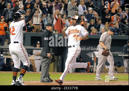 Baltimore Orioles Adam Jones celebrates with fans after the Orioles won the American  League East championship, defeating the Toronto Blue Jays 8-2 at Orioles  Park at Camden Yards in Baltimore, Maryland on