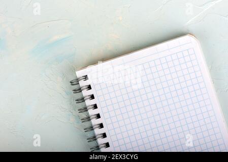Top view of a blank sheet of squared notebook. Copy space. Stock Photo