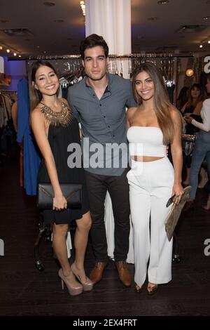 MIAMI, FL - MAY 07: Angela Rincon and Danilo Carrera are seen during the  launch of Chiqui Delgado collection for David Lerner NY on May 7, 2015 in  Miami, Fl. (Photo by