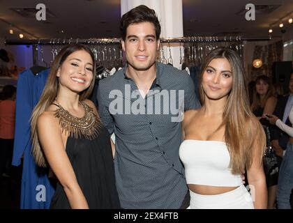 MIAMI, FL - MAY 07: Angela Rincon and Danilo Carrera are seen during the  launch of Chiqui Delgado collection for David Lerner NY on May 7, 2015 in  Miami, Fl. (Photo by