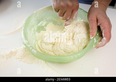 homemade dumplings in the kitchen without decorations. making dumplings with minced pork, beef and chicken Stock Photo