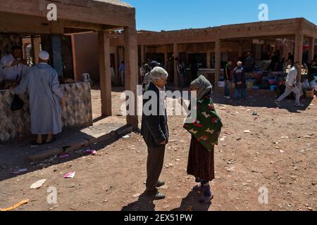 Telouet, Morocco - April 14, 2016: Street scene in the village of Telouet, in the Atlas Region of Morocco, with people in a street market. Stock Photo