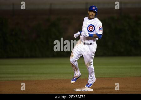 Chicago Cubs Addison Russell makes a catch on a pop up off the bat of St.  Louis Cardinals Magneuris Sierra while Javier Baez waits as a backup in the  sixth inning at