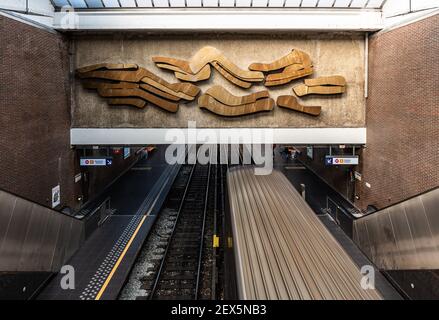 Auderghem, Brussels Capital Region / Belgium: 11 05 2020: Urban train passing the station of Petillon Stock Photo