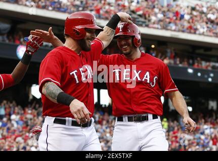 https://l450v.alamy.com/450v/2ex5txf/the-texas-rangers-josh-hamilton-left-and-adam-rosales-congratulate-each-other-after-scoring-against-the-boston-red-sox-during-the-fifth-inning-on-saturday-may-30-2015-at-globe-life-park-in-arlington-texas-photo-by-jim-cowsertfort-worth-star-telegramtns-please-use-credit-from-credit-field-2ex5txf.jpg