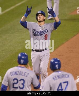 Los Angeles Dodgers' Yasmani Grandal, left, and Chase Utley, right