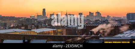 Brussels Capital Region - Belgium - 02 08 2021: Panoramic view over the Brussels skyline during sunrise over the municipalities of Laeken, Jette, Koek Stock Photo