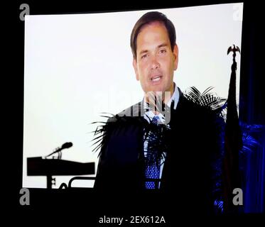 An empty podium is seen in the foreground as GOP presidential contender Sen. Marco Rubio delivers remarks via teleconference during Florida Gov. Rick Scott's Economic Growth Summit on Tuesday, June 2, 2015, at the Yacht & Beach Club Convention Center at Walt Disney World in Lake Buena Vista, Fla. Rubio had to cancel his appearance due to U.S. Senate business. (Photo by Joe Burbank/Orlando Sentinel/TNS) *** Please Use Credit from Credit Field ***