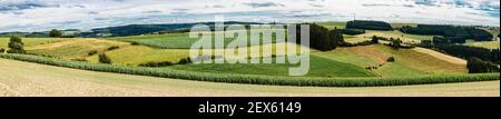 Panoramic view over the agriculture fields and meadows of the East-Belgian countryside near Burg-Reuland Stock Photo