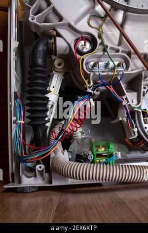 washing machine disassembled with open enclosure is ready for service Stock Photo