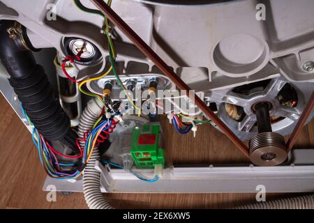 washing machine disassembled with open enclosure is ready for service Stock Photo
