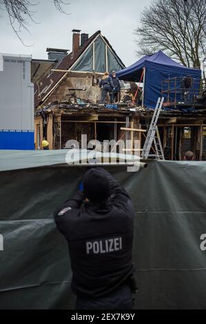 Nortorf, Germany. 04th Mar, 2021. Police personnel secure and investigate a destroyed end-of-terrace house after an explosion. Inside the house, police have found a body. Credit: Gregor Fischer/dpa/Alamy Live News Stock Photo