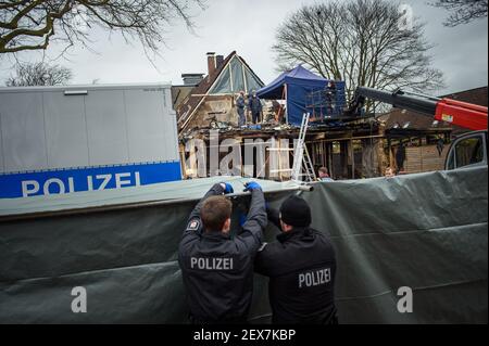 Nortorf, Germany. 04th Mar, 2021. Police personnel secure and investigate a destroyed end-of-terrace house after an explosion. Inside the house, police have found a body. Credit: Gregor Fischer/dpa/Alamy Live News Stock Photo