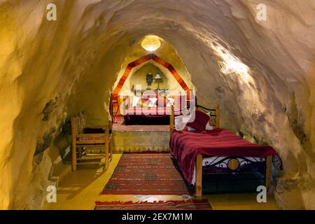 hotel room carved into the side of a mountain Stock Photo