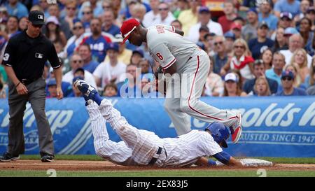 Chicago Cubs catcher Kyle Schwarber (12) between innings during a game  against the Atlanta Braves on July 18, 2015 in Atlanta, Georgia. The Cubs  defeated the Braves 4-0. (Tony Farlow/Four Seam Images